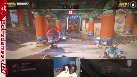 @Boltzdameek playing Overwatch with a handiCAT for extra challenge