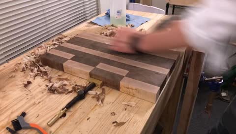Mad man uses hand plane to flatten end grain
