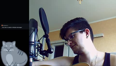 playing guitar and talking