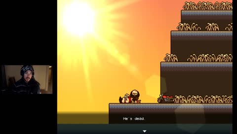 cave on level just above brad hidden behind grass