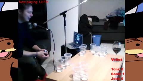 A man cleans water from his own carpet with his own shirt
