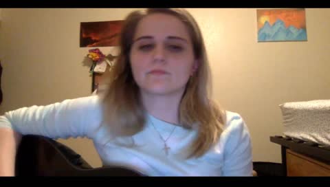 Abbie throws her guitar pick across the room