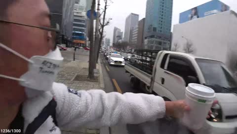 Angel of Korea diverting traffic from accident