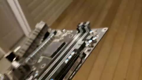 Throwing motherboard out window.